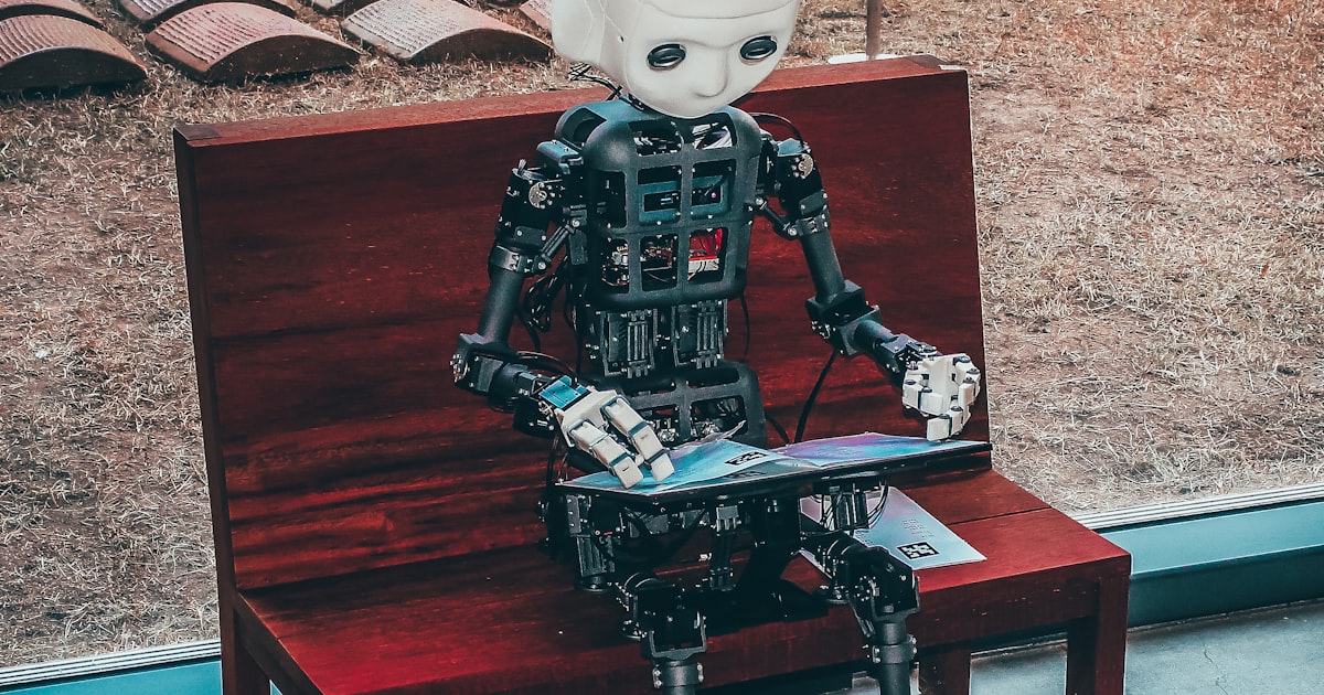 A robotic figure representing AI working alongside human tools — the concept behind MCP-powered email conversion.